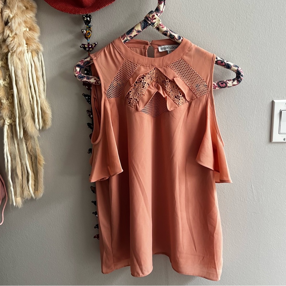 Cute pink rayon blouse.
